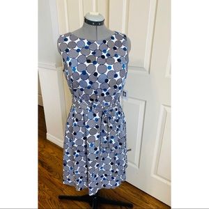 New with Tags for and flare Anne Klein Navy White polka dot dress with pockets.